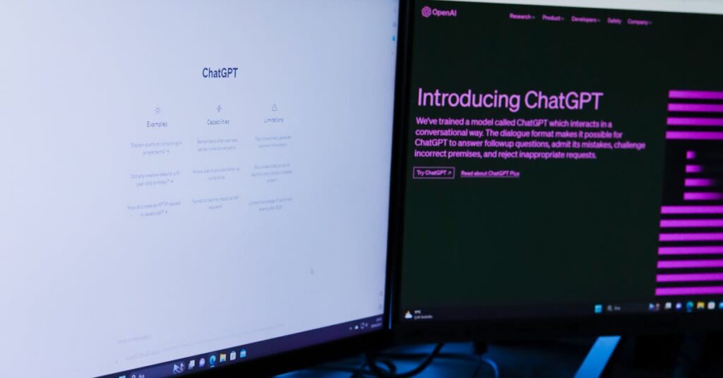 Vertical shot of a dual monitor setup with ChatGPT on screens, ideal for technology and AI concepts.